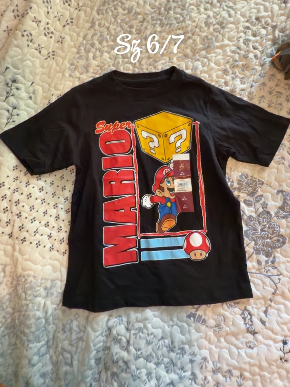 Nintendo Black Super Mario Graphic Tee with Red Logo